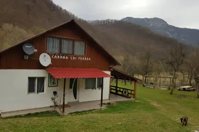 Image de Cabana lui Foardă a cozy retreat where tranquility rules. . . .