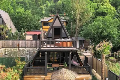 Image de \n2+1 Lake view - Private heated pool - Jacuzzi - 5 person bungalow