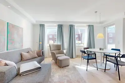 Image de Modern, stylishly renovated 3-room apartment with balcony near the beach