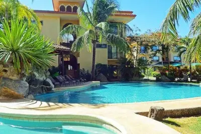 Image de 2-bedroom apartment in beautiful gated community 3 pools nearby Tamarindo Beach.