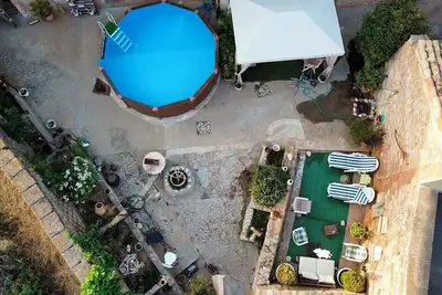 Image de Maison de vacances 'Casa Calvo' avec vue sur les montagnes, piscine privée et Wi-Fi