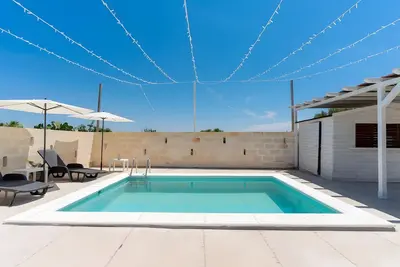 Image de Maison de vacances 'Dilauro Con Piscina 2' avec piscine partagée, terrasse partagée et climatisation