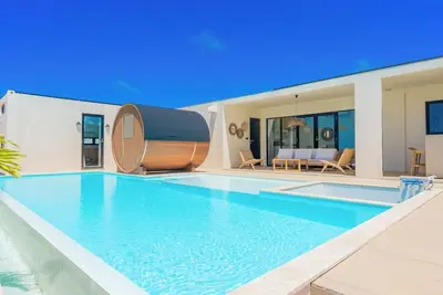 Image de A private villa with a pool jacuzzi and sauna overlooking the ocean from a high vantage point / Miyakojima Okinawa