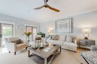 Image de Elegant retreat near the sea with a covered balcony, chef's kitchen, W/D, & Ac