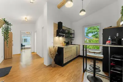 Image de Flussperle Miesbach | Dream vacation apartment with river view and roof terrace