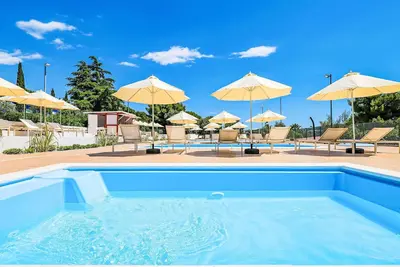 Image de Joli appartement pour 4 personnes avec climatisation, Wifi, piscine, Tv, terrasse et animaux admis