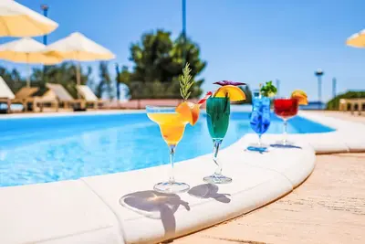 Image de Bel appartement pour 5 personnes avec climatisation, Wifi, piscine, Tv, terrasse et animaux admis