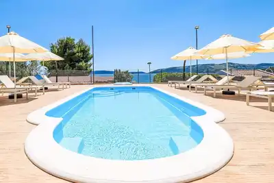 Image de Agréable appartement avec climatisation, piscine, Wifi, Tv, terrasse et animaux admis
