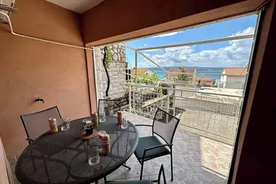 Image de Appartement de vacances avec balcon et vue sur la mer