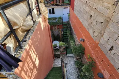 Image de Cozy Eco Hostel with rooftop, surf, sunset, and high-speed internet