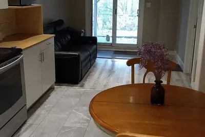 Airy, spacious, nature facing walk-out suite