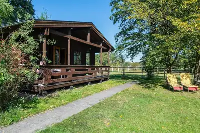 Image de Cabane en rondins avec vue sur le pâturage, Eschede