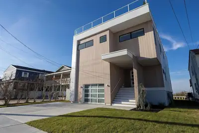 Discover a modern architectural bay front house on the water!