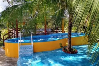 Image de Charming 2-bedroom house with WiFi, Ac, Pet Friendly, piscina in welcoming Xul-Ha