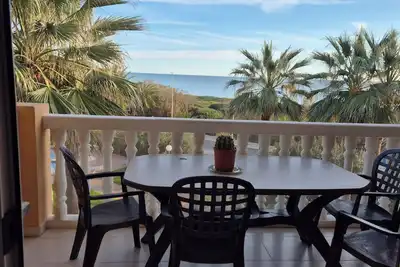 Image de Bel appartement en 1ere ligne vue mer, piscine et palmiers