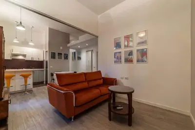 Image de Cozy apartment of about 70 square meters, perfect for 4 people, located on the first floor of a period building (No elevator). The property is located in the Prati district, in one of the areas most loved by citizens, full of services and well connected t