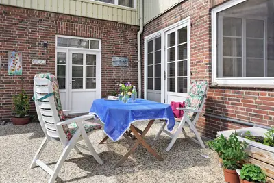 Image de Appartement 'Lüttmoor' avec terrasse privée, jardin partagé et Wi-Fi