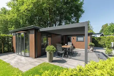 Image de Luxury and new 4p chalet in wooded area on the edge of the Veluwe
