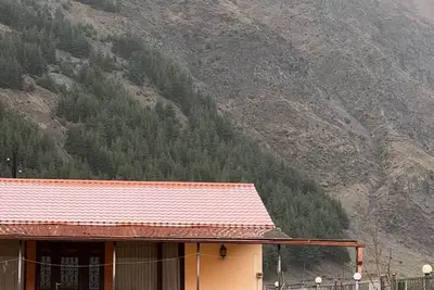 Image de A Private Guest House in a secluded area by the river, surrounded by mountains.
