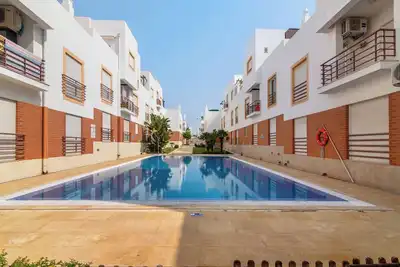 Image de Appartement 'Duplex Em Tavira' avec piscine partagée, Wi-Fi et climatisation