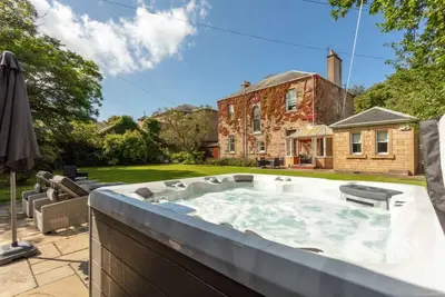 Image de Beach lodge with Hot Tub