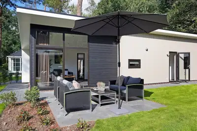 Image de Lodge forestier chic avec sauna