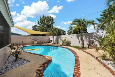 Image de SpaceCoast Charm — 3br Home. Heated Pool & Terrace