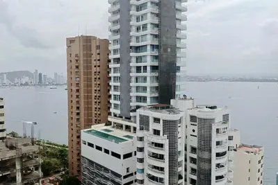 Image de Cozy apartment near Ocean, 5 Min to Old City. Pool, Gym & Sauna.