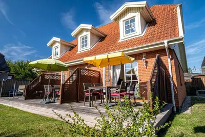 Image de Maison de vacances 'Zu Den 3 Tannen - Nr 5' avec terrasse privée, jardin partagé et Wi-Fi