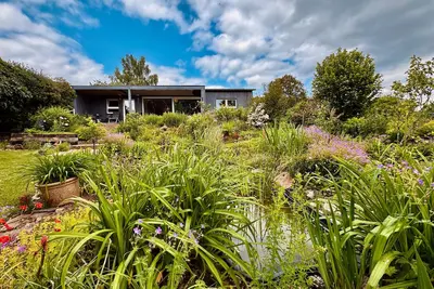 Image de Maison de vacances 'Im Grünen' avec terrasse privée, Wi-Fi et climatisation