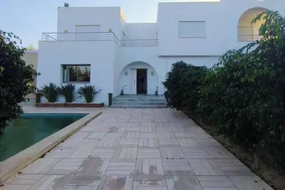 Image de Charming 1000 sqm 4-bedroom villa with Pool, WiFi in Hammamet