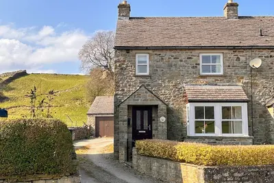 A cosy stone cottage with stunning views, village charm, and adventure at your doorstep
