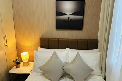 Image de Cozy 2-bedroom condo with Ac, WiFi in pleasant Makati