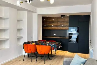 Central, modern apartment with balcony