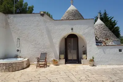 Image de Trullo 'Del Paradiso' avec piscine privée, terrasse privée et Wi-Fi