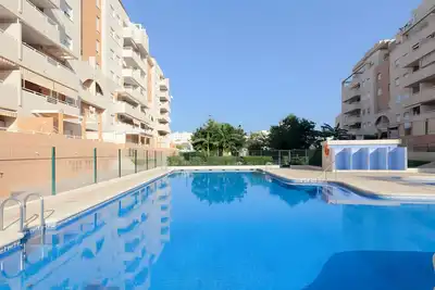 Appartement 'Jardines De Playa Gandia' avec piscine partagée, Wi-Fi et climatisation