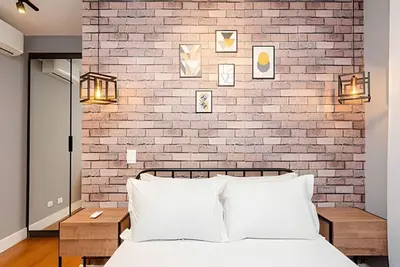 Image de Um Quarto Super Fofo perto do Hard Rock, Ar e Wifi