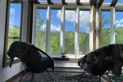 Image de Superbe condo face aux pentes de ski Stoneham!