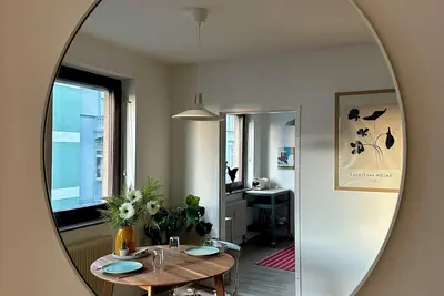 Image de Central apartment with parking space, right next to the park and in the old town.