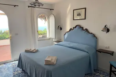 Image de Perched high above the Bay of Naples, Casa Blu is a charming Capri-style villa.