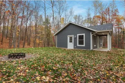 Image de \"Hidden Oasis\" Cozy 2br Cabin in the Woods