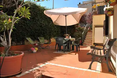 Image de Casa Marta avec jardin et jacuzzi