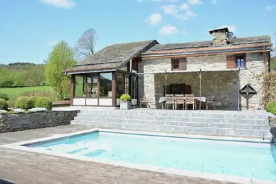 Image de Villa à Trois Ponts avec jacuzzi, sauna, piscine