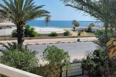 Image de Duplex pied dans l'eau avec vue sur mer Extraordinaire