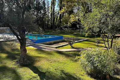 Image de Spacious chalet with 9 bedroom, Ac, WiFi, pool, 8000m2 park in Chacras de Coria