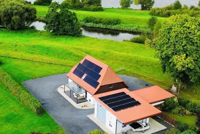 Image de Young dyke house Idyllically situated on the Oste with a view of Lake Vörder
