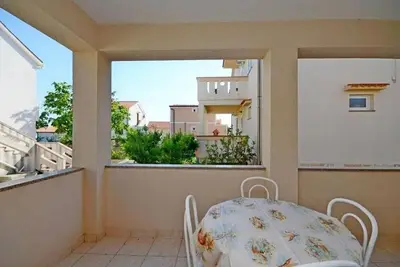 Image de Appartement de deux chambres avec la terrasse Novalja, Pag (A-23663-a)