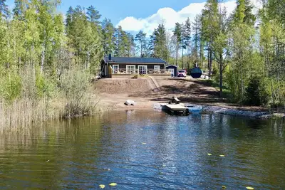 Image de New vacation home in Småland directly on the lake with boat, sauna, wooden hot tub and much more.