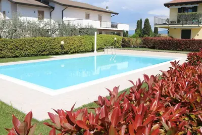 Image de Joli appartement pour 4 personnes avec piscine, Wifi, climatisation et Tv