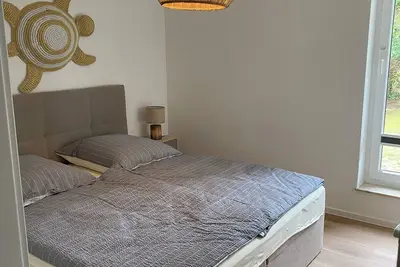 Image de Newly renovated and cozy apartment. Pet friendly!